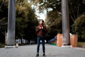 front view man posing outdoors big poles