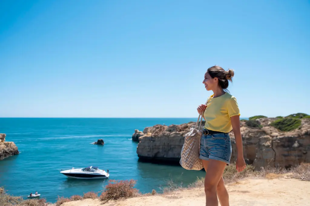 young woman traveling without covid by sea